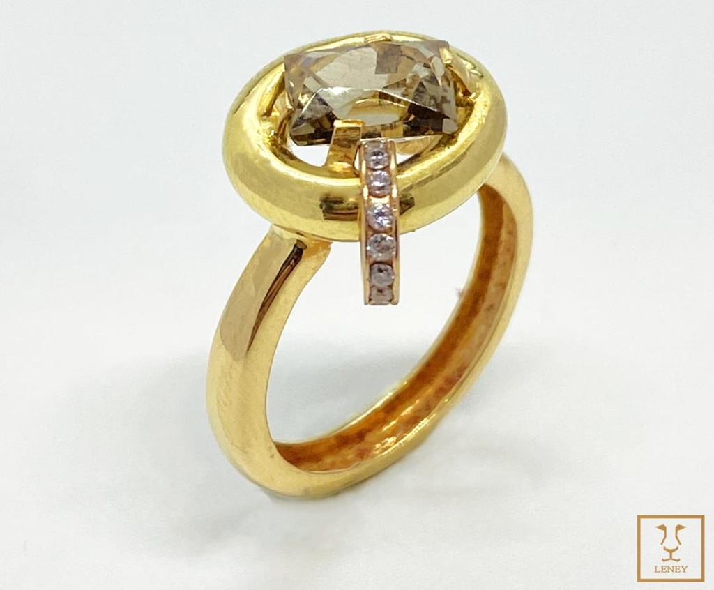 ANILLO OVAL TUBO CON TOPAZIO