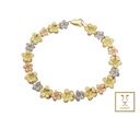 PULSERA FLOR TRES OROS